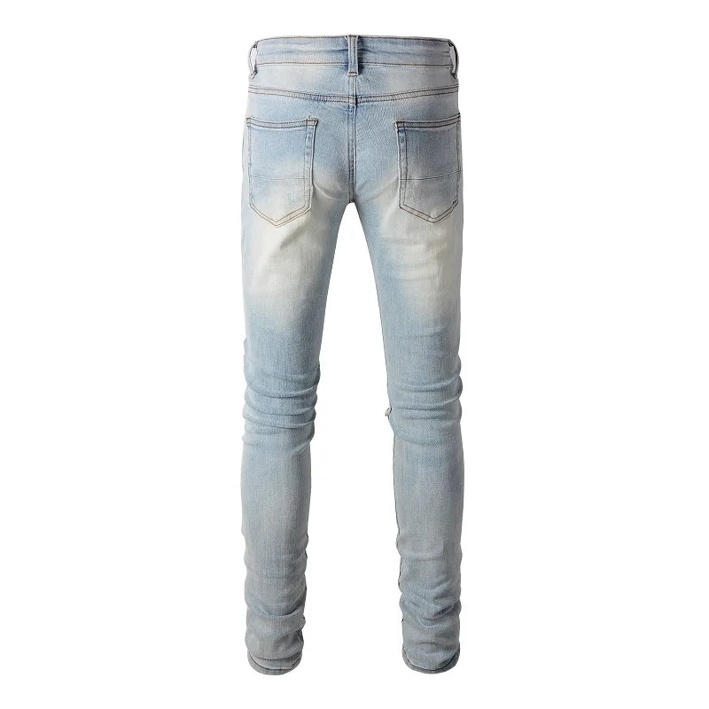 Light Blue Mixed Artwork Distressed Jeans – Taelor Boutique