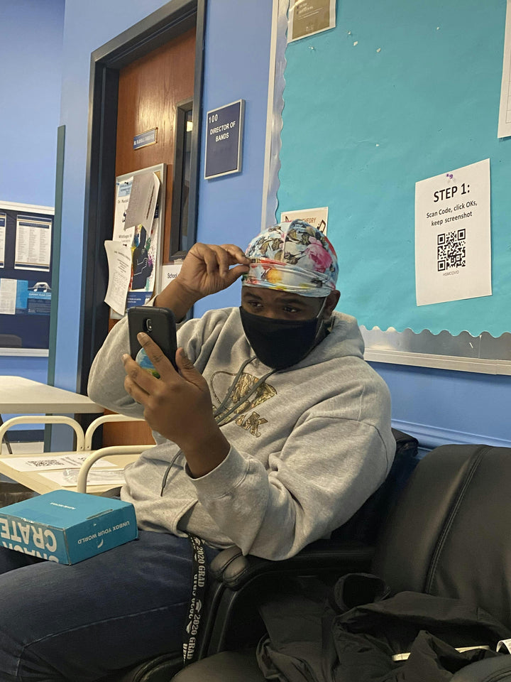 Taelor Boutique customer wearing a silky floral durag